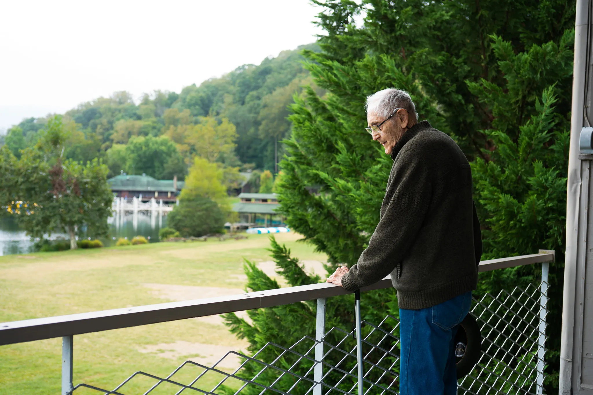 Frank Hursh overlooking Black Mountain campus from the balcony of the old Studies Building.